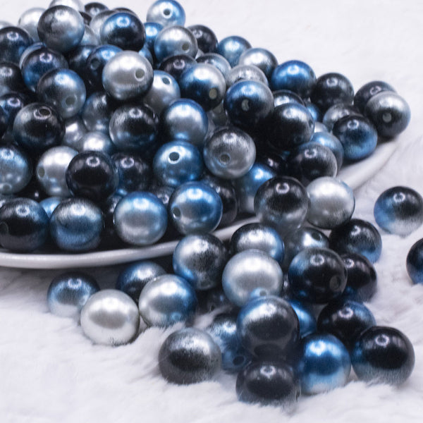 front view of a pile of 12mm Blue and Black Ombre Shimmer Faux Pearl Bubblegum Beads