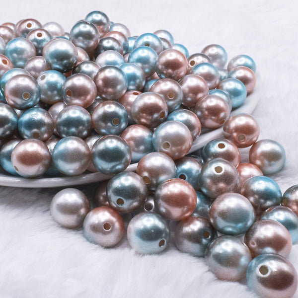 front view of a pile of 12mm Blue and Brown Ombre Shimmer Faux Pearl Bubblegum Beads