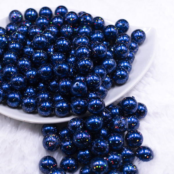 Front view of a pile of 12mm Dark Blue with Glitter Faux Pearl Acrylic Bubblegum Beads - 20 Count