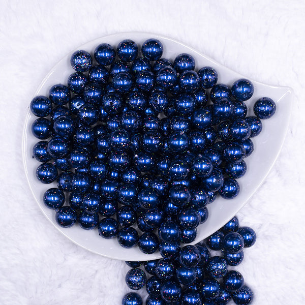 Top view of a pile of 12mm Dark Blue with Glitter Faux Pearl Acrylic Bubblegum Beads - 20 Count