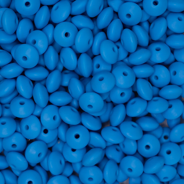 top view of a pile of 12mm Blue Lentil Silicone Bead