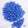 top view of a pile of 12mm Blue Transparent Star Shaped Bubblegum Beads - 20 Count