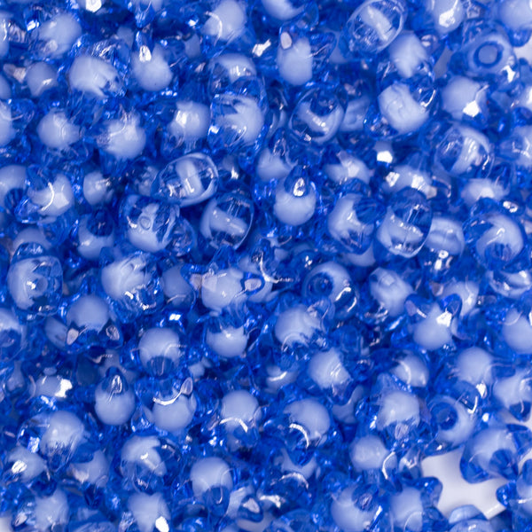 close up view of a pile of 12mm Blue Transparent Star Shaped Bubblegum Beads - 20 Count