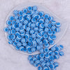 Top view of a pile of 12mm Blue with White Stripes Resin Chunky Bubblegum Beads