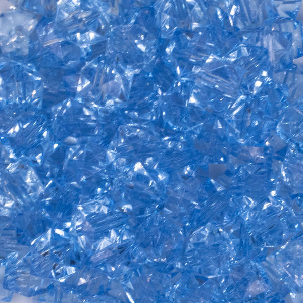 close up view of a pile of 12mm Sky Blue Transparent Cube Faceted Bubblegum Beads