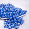 front view of a  pile of 12mm Blue Transparent Pumpkin Shaped Bubblegum Beads