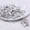 Front view of a pile of 12MM Wavy Silver Rondelle Spacer Beads [Set of 10]