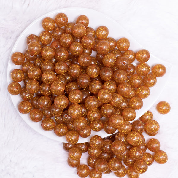 top view of a pile of 12mm Burnt Orange Shimmer Glitter Sparkle Bubblegum Beads - 20 Count
