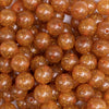 close up view of a pile of 12mm Burnt Orange Shimmer Glitter Sparkle Bubblegum Beads - 20 Count