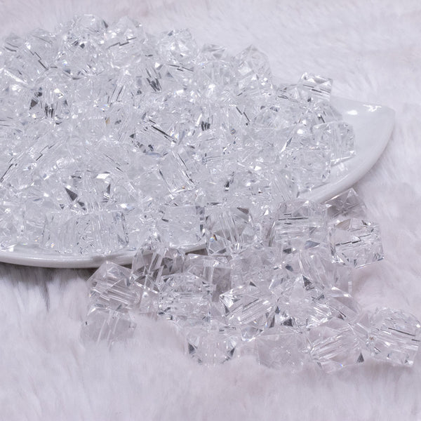 front view of a pile of 12mm Clear Transparent Cube Faceted Bubblegum Beads