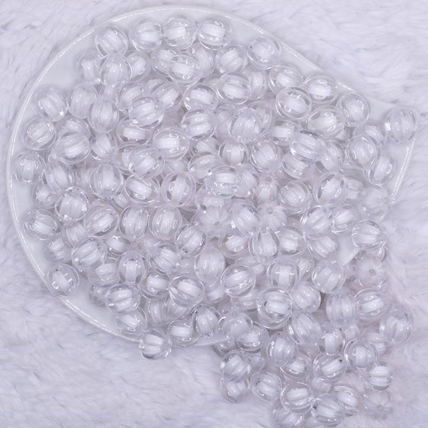 top view of a pile of 12mm Clear Transparent Pumpkin Shaped Bubblegum Beads