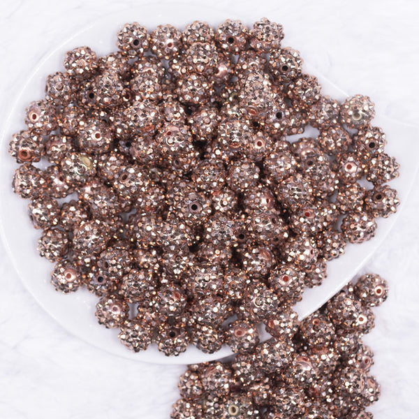 top view of a pile of 12mm Copper Brown Rhinestone AB Bubblegum Beads - Choose Count