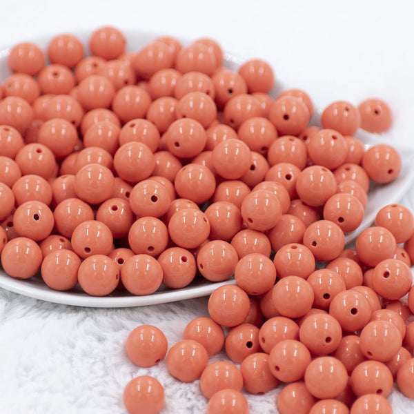 Front view of a pile of 12mm Coral Orange Acrylic Bubblegum Beads [20 & 50 Count]