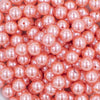 Close up view of a pile of 12mm Coral Pink Faux Pearl Acrylic Bubblegum Beads [20 Count]