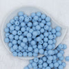 Top view of a pile of 12mm Cornflower Blue Matte Acrylic Bubblegum Beads