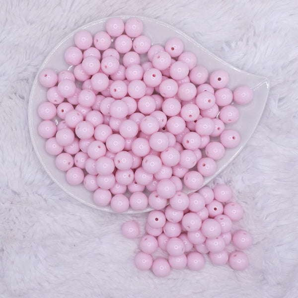 top view of a pile of 12mm Cotton Candy Pink Solid Acrylic Bubblegum Beads