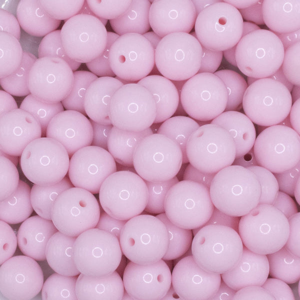 close up view of a pile of 12mm Cotton Candy Pink Solid Acrylic Bubblegum Beads