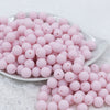 Front view of a pile of 12mm Cotton Candy Pink Matte Acrylic Bubblegum Beads