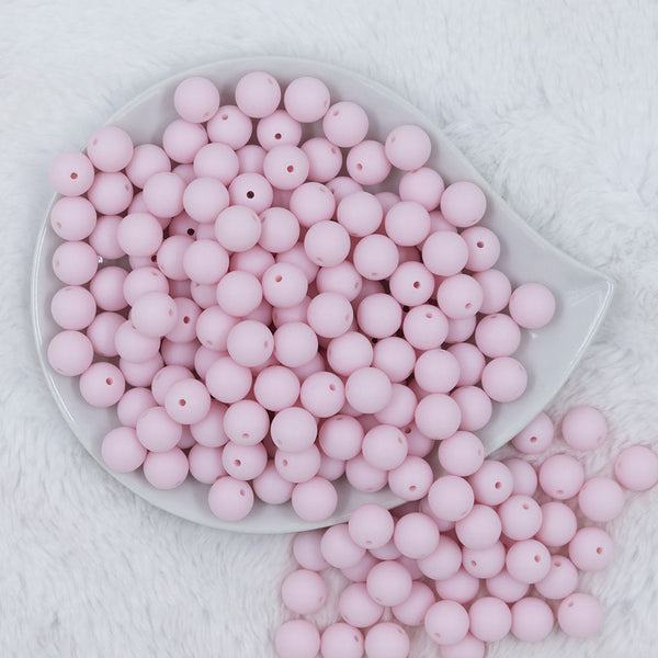 Top view of a pile of 12mm Cotton Candy Pink Matte Acrylic Bubblegum Beads