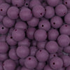Close up view of a pile of 12mm Cranberry Red Matte Acrylic Bubblegum Beads