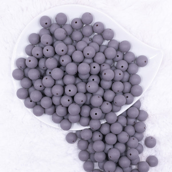 Top view of a pile of 12mm Dark Gray Matte Acrylic Bubblegum Beads