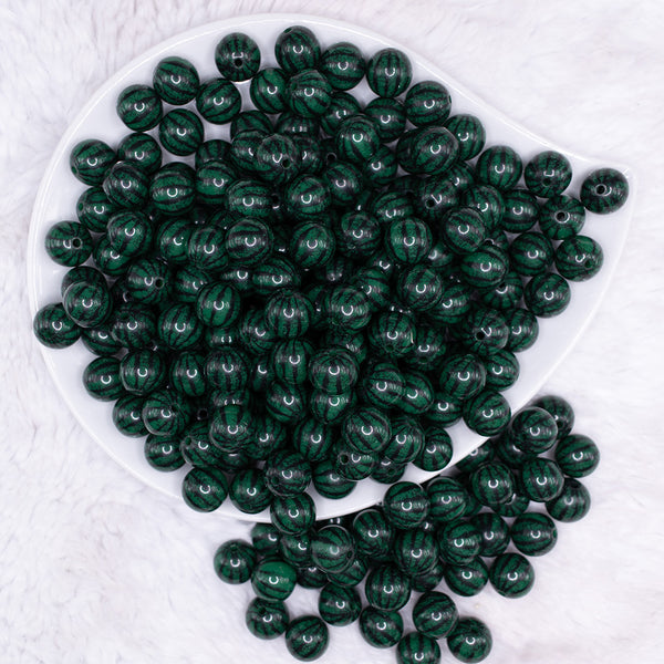 top view of a pile of 12mm Dark Green Watermelon Pattern Print Bubblegum Beads