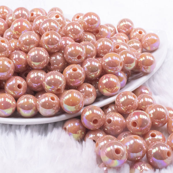 front view of a pile of 12mm Dark Salmon AB Solid Acrylic Bubblegum Beads