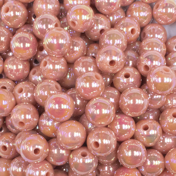 close up view of a pile of 12mm Dark Salmon AB Solid Acrylic Bubblegum Beads