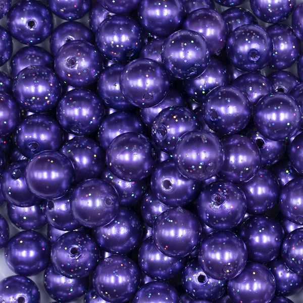 close up view of a pile of 12mm Iris Purple with Glitter Faux Pearl Acrylic Bubblegum Beads - 20 Count