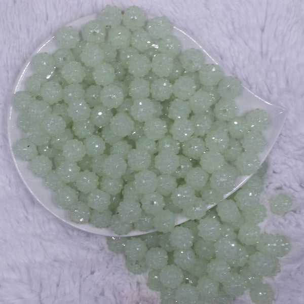 top view of a pile of 12mm Glow in the Dark Rhinestone Bubblegum Beads