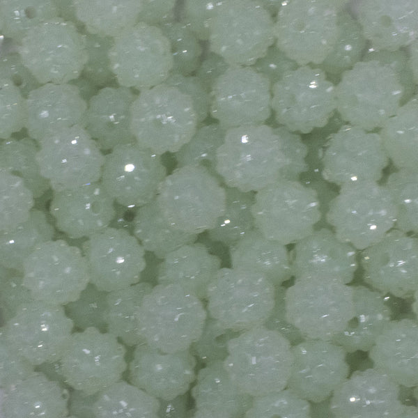 close up view of a pile of 12mm Glow in the Dark Rhinestone Bubblegum Beads