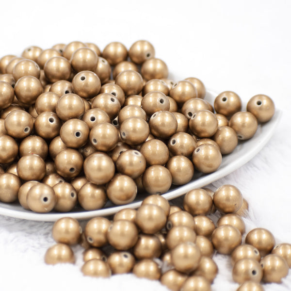 front view of a pile of 12mm Gold Pearl Acrylic Bubblegum Beads [20 Count]
