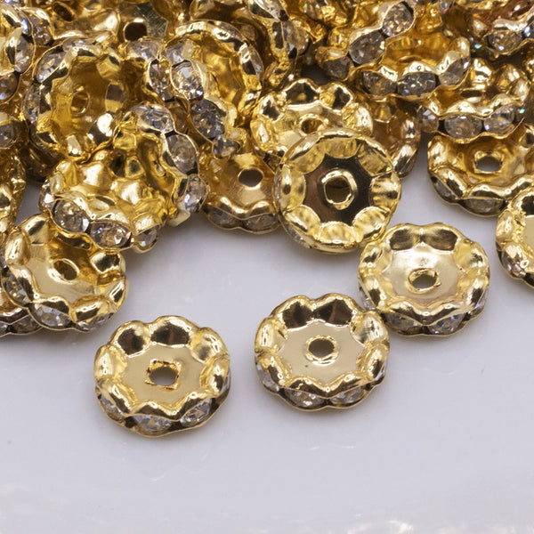 top view of a pile of 12MM Wavy Gold Rondelle Spacer Beads [Set of 10]