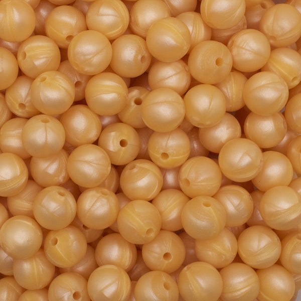 close up view of a pile of 12mm Golden Yellow Round Silicone Bead