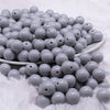 front view of a pile of 12mm Light Gray Acrylic Bubblegum Beads - 20 Count