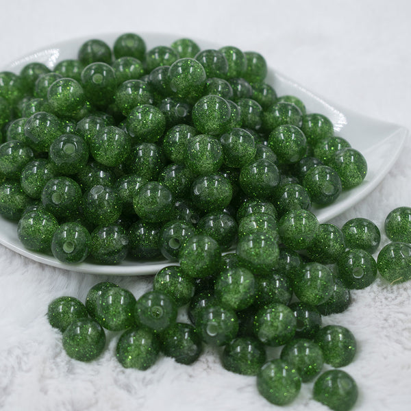 Front view of a pile of 12mm Green Glitter Sparkle Chunky Acrylic Bubblegum Beads