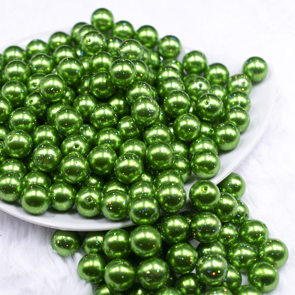 Front view of a pile of 12mm Green with Glitter Faux Pearl Acrylic Bubblegum Beads - 20 Count