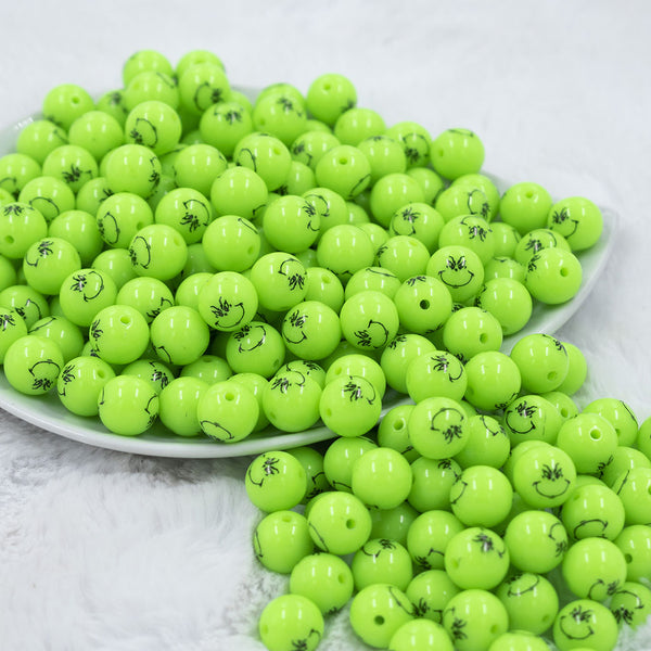 Front view of a pile of 12mm Grinch Smirk Face Print Chunky Acrylic Bubblegum Beads [20 Count]