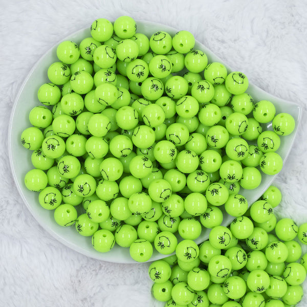 Top view of a pile of 12mm Grinch Smirk Face Print Chunky Acrylic Bubblegum Beads [20 Count]