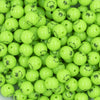 Close up view of a pile of 12mm Grinch Smirk Face Print Chunky Acrylic Bubblegum Beads [20 Count]