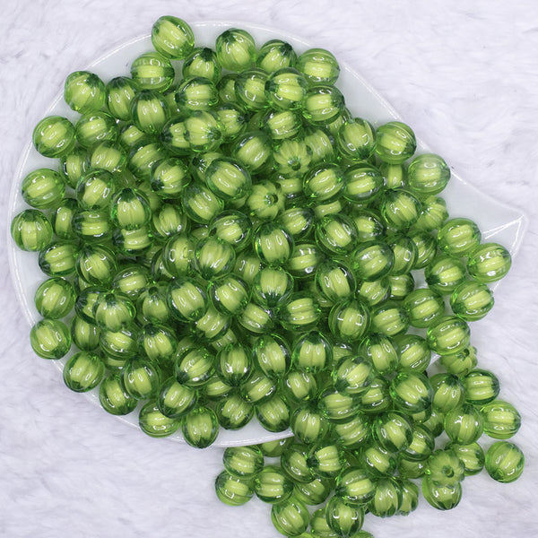 top view of a pile of 12mm Green Transparent Pumpkin Shaped Bubblegum Beads