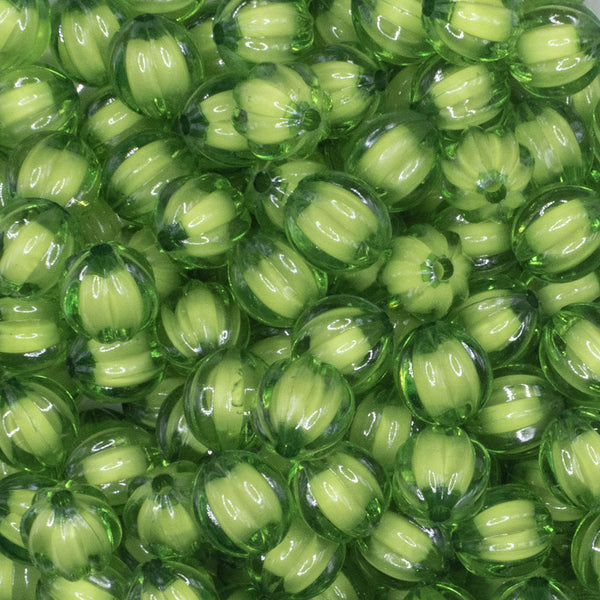 close up view of a pile of 12mm Green Transparent Pumpkin Shaped Bubblegum Beads