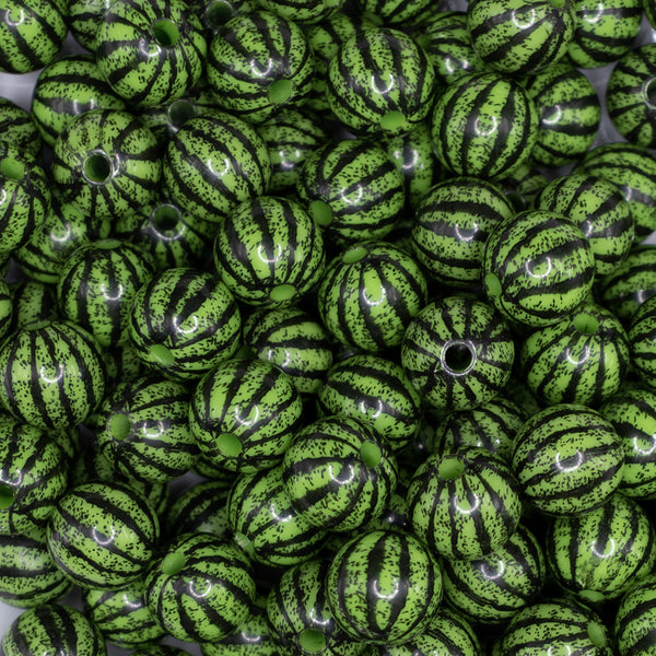 close up view of a pile of 12mm Bright Green Watermelon Pattern Print Bubblegum Beads