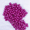 Top view of a pile of 12mm Hot Pink with Glitter Faux Pearl Acrylic Bubblegum Beads - 20 Count