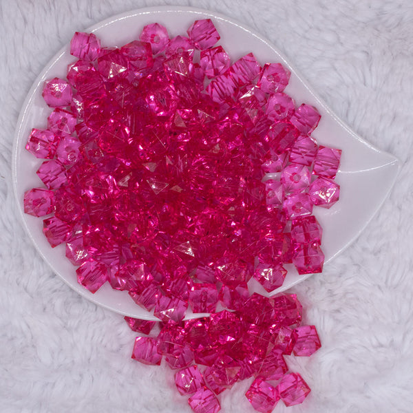top view of a pile of 12mm Hot Pink Transparent Cube Faceted Bubblegum Beads