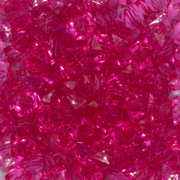 close up view of a pile of 12mm Hot Pink Transparent Cube Faceted Bubblegum Beads