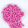 Top view of a pile of 12mm Bright Pink with White Stripes Resin Chunky Bubblegum Beads