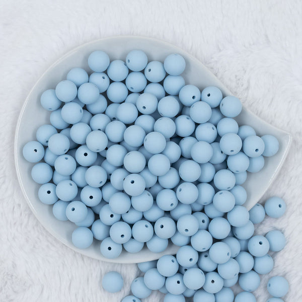 Top view of a pile of 12mm Ice Blue Matte Acrylic Bubblegum Beads