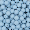 Close up view of a pile of 12mm Ice Blue Matte Acrylic Bubblegum Beads
