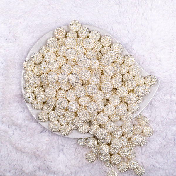 Top view of a pile of 12mm Off White Ball Bead Chunky Acrylic Bubblegum Beads